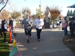 About to cross the finish line at the Roseville Turkey Trot 2010